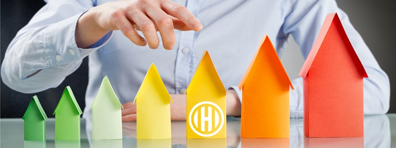 paper houses with Hogan Associates logo